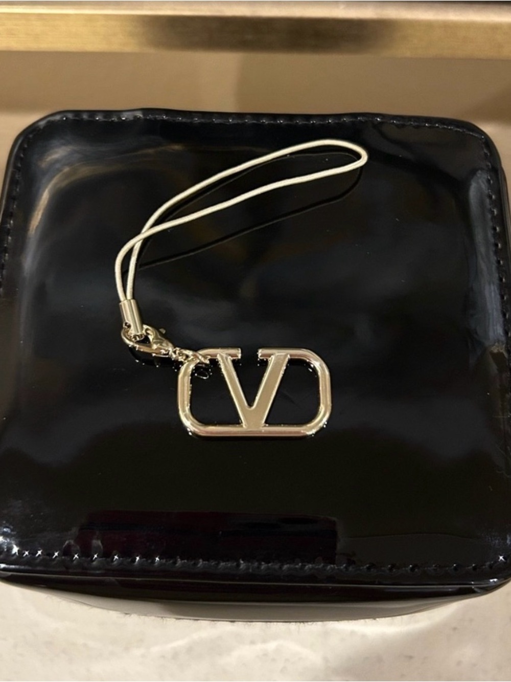 Valentino ‘V’ Phone Charm